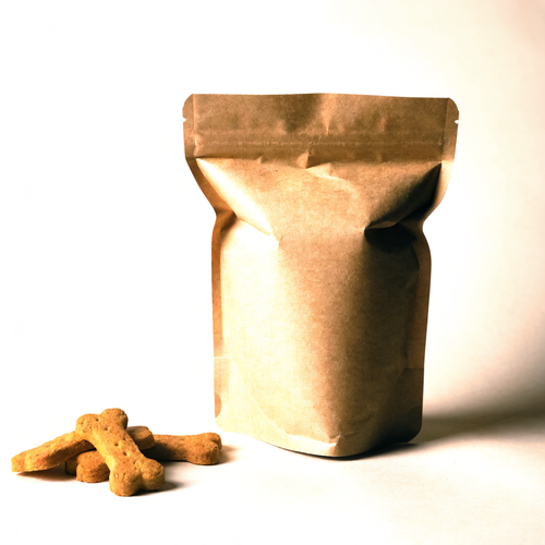Good Dog Bikkies peanut butter dog treats in a kraft pouch with bone-shaped biscuits